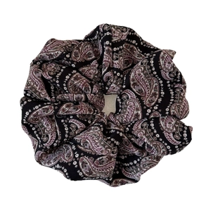 Elegant oversized black paisley print fabric scrunchie with purple floral patterns