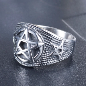 Men's punk rock pentagram star ring in cast titanium steel with textured background