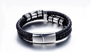 Detail of men's double-layer black braided leather bracelet with magnetic steel clasp
