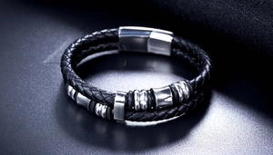 Close-up of dual-layer braided leather bracelet with stainless steel magnetic clasp