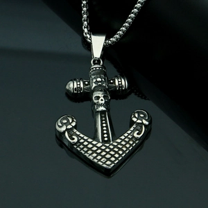 Gothic anchor pendant necklace with skull motif and vintage filigree on black background