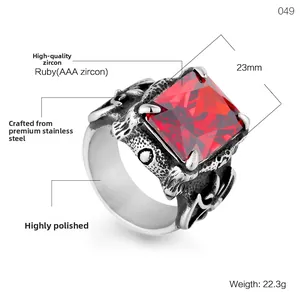 Vintage gothic dragon claw ring for men featuring ruby red zircon in stainless steel