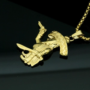 Polished golden box chain necklace with a detailed pirate gunman pendant in hip-hop style