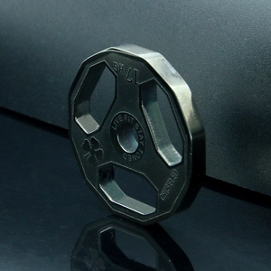Macro shot of 17KG dumbbell plate pendant with Live Fit Stay Toned engraving