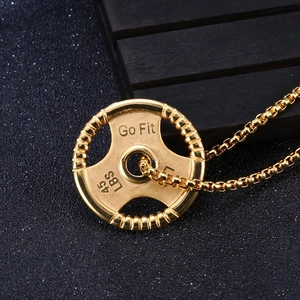 Golden fitness necklace with barbell weight plate pendant engraved with Go Fit and 45 LBS