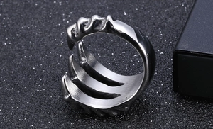 Macro shot of silver titanium dragon claw ring detail with adjustable opening