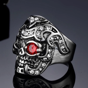 Vintage punk skull ring with red ruby eyes and white crystal inlay in stainless steel