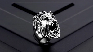 Macro view of highly detailed roaring lion head ring in vintage silver stainless steel