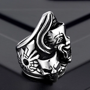 Retro crow punk skull clown mask ring in oxidized steel with black gemstone detail