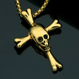 Collier avec pendentif crâne et os croisés en acier inoxydable doré poli et chaîne
