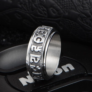 Vintage rotating spinner ring with mantra engraving in polished silver stainless steel