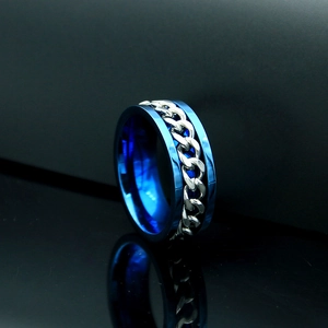 Anillo giratorio para hombre con acabado azul y diseño de cadena cubana plateada de acero