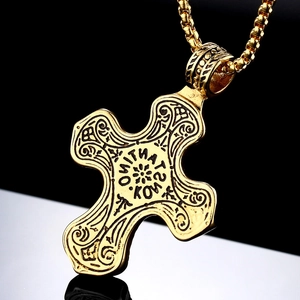 Ornate gold titanium steel cross pendant with zircon and intricate carvings on pearl chain