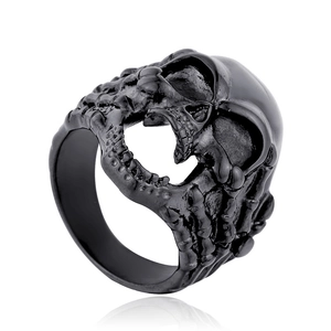 Vintage black gothic skull ring for men with unique skeleton hand claw design detailing