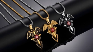 Gothic bat cross pendant necklace with red gemstone in gold and silver finishes