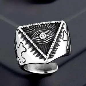 Macro shot of punk style stainless steel Eye of Providence ring with vintage oxidation
