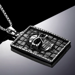 Punk style stainless steel square pendant necklace featuring a 3D skull on crossweave texture