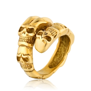 Gothic style gold titanium steel ring featuring detailed carved skull head design