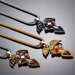 Gothic bat wing cross necklace with red gemstone in black, gold and vintage gold