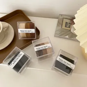 Lot de 24 élastiques à cheveux haute élasticité aux tons terreux dans une boîte acrylique