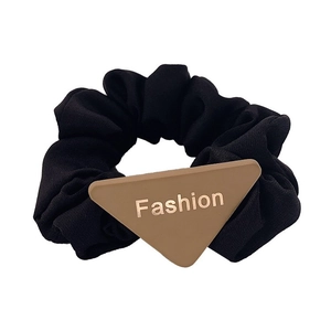 Minimalist black scrunchie hair tie with brown triangle Fashion charm for ponytails