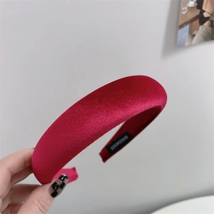 Detail view of handmade deep red velvet sponge headband with high thickness
