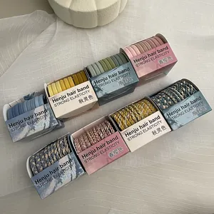Detailed set of candy-colored elastic hair bands in assorted twist and smooth styles