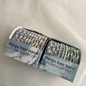 Detail of candy-colored spiral hair ties in high-elasticity sets for ponytail styling