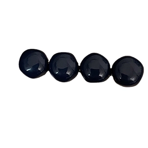 Vintage style hair clip with four glossy navy blue decorative spheres on a white background
