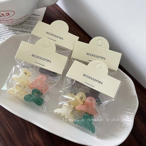 Set of 8 cute jelly color mini butterfly hair claws in elegant minimalist packaging