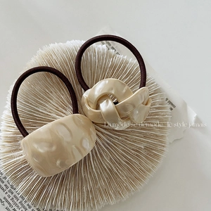 Japanese retro beige resin hair ties with marble texture and braided knot design