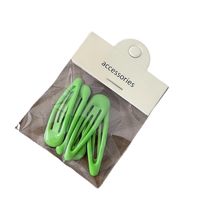 Set of 5 minimalist green drip oil waterdrop hair clips in retail packaging