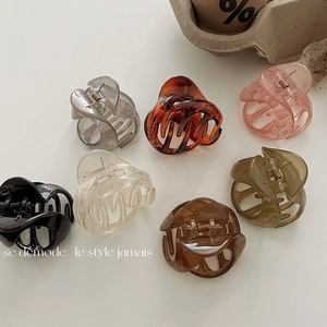 Set of 7 colorful jelly hair claws in acetate finish for versatile hairstyling options