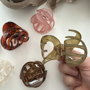 Medium jelly colored hair claw clips in five assorted matte and transparent finishes