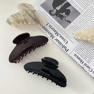 Set of 3 large acetate claw clips in marble beige, coffee brown and classic black colors