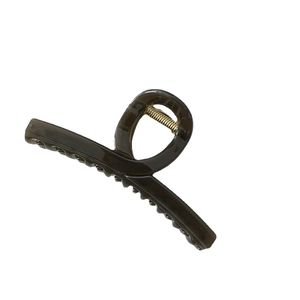 Minimalist translucent resin hair claw clip in dark amber coffee brown with gold spring