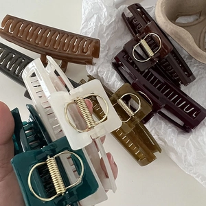 Minimalist large rectangular hair claws in various earth tones and glossy finish