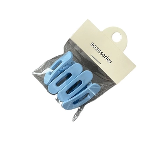 Lot de deux pinces à cheveux en plastique bleu clair mat avec emballage de carte d'accessoires
