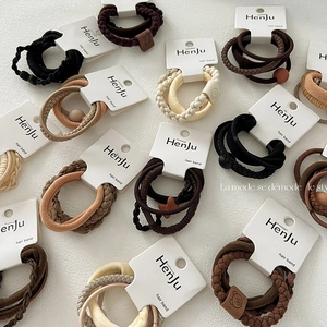 Neutral earth tone hair elastic band sets with beads and woven texture on cards