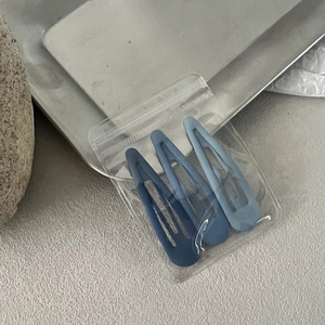Three-piece matte blue gradient BB hair clips set with metallic frosted finish and packaging