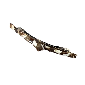 Elegant tortoiseshell acetate bow spring clip barrette with brown and cream marble pattern