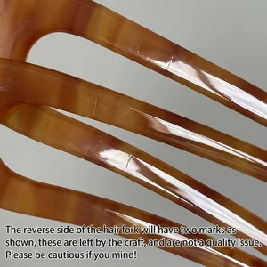 Minimalist tortoiseshell resin U-shaped hair fork with elegant amber texture