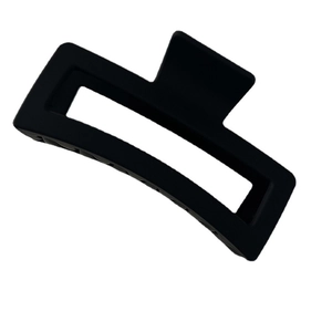Matte black oversized rectangular hair claw clip for thick hair styling on white background