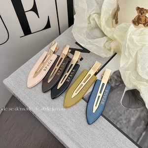 Set of five colorful acetate no-crease hair clips with gold metal base for women