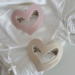 Irregular heart hair clips in matte pink and apricot resin with silver spring metal