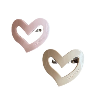 Minimalist cream heart hair clips set in pink and off-white resin for girls