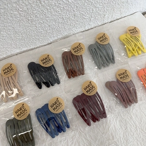 Detailed view of 5-piece minimalist BB hair clip set in assorted Morandi colors