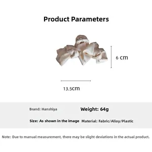 Detailed size and weight specs for the large beige satin bow hair claw clip