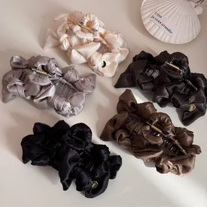 Elegant satin bow shark hair clips with metallic logo in five assorted neutral colors