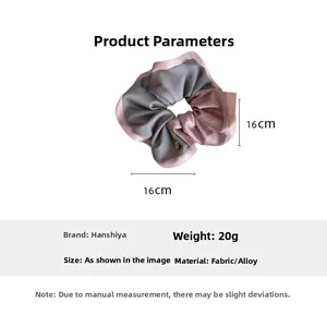 Detail of grey and pink satin scrunchie showing 16cm dimensions and alloy pendant accessory
